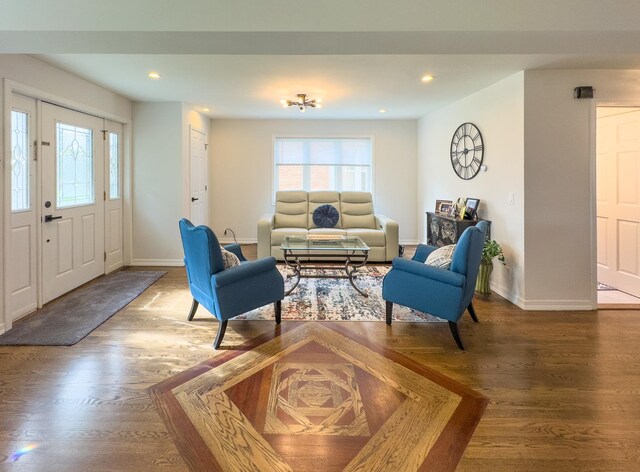 8024 N Odell Ave, Niles, IL 60714 - living room featuring baseboards, wood finished floors, and recessed lighting