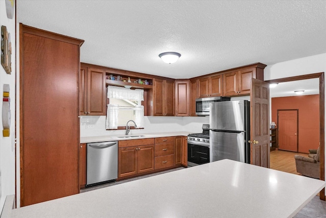 2908 Rolling Acres Dr, Champaign, IL 61822 - kitchen with stainless steel appliances, light countertops, brown cabinets, open shelves, and a textured ceiling