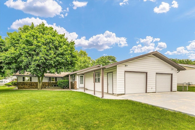 2908 Rolling Acres Dr, Champaign, IL 61822 - ranch-style house with a front yard, driveway, and a garage