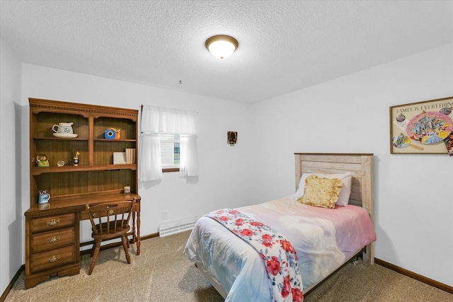 2908 Rolling Acres Dr, Champaign, IL 61822 - bedroom featuring light carpet, a baseboard radiator, and a textured ceiling