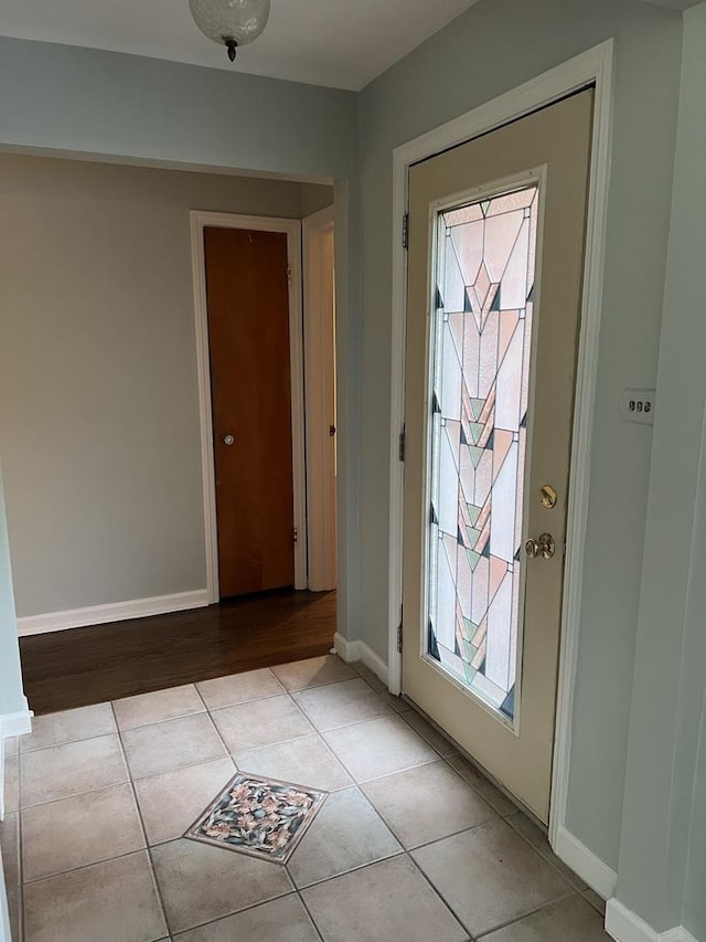 12200 S 88th Ave, Palos Park, IL 60464 - entryway featuring light tile patterned floors, plenty of natural light, and baseboards