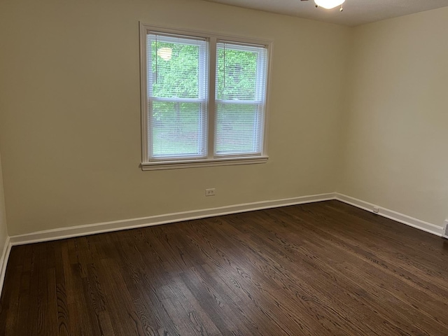 12200 S 88th Ave, Palos Park, IL 60464 - unfurnished room with dark wood-type flooring, baseboards, and ceiling fan