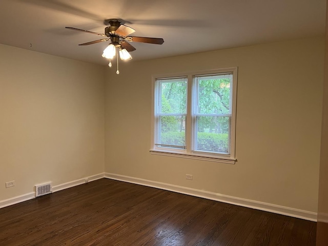 12200 S 88th Ave, Palos Park, IL 60464 - spare room featuring dark wood-type flooring, ceiling fan, and baseboards