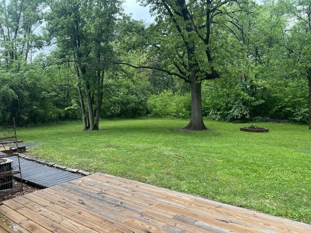 12200 S 88th Ave, Palos Park, IL 60464 - wooden deck featuring a lawn and central AC unit