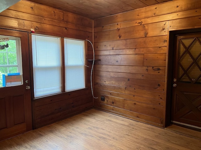 12200 S 88th Ave, Palos Park, IL 60464 - spare room with light wood-style floors, wood walls, and wood ceiling