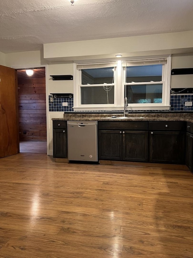 12200 S 88th Ave, Palos Park, IL 60464 - kitchen featuring dishwasher, light wood-style floors, a sink, dark stone countertops, and a textured ceiling