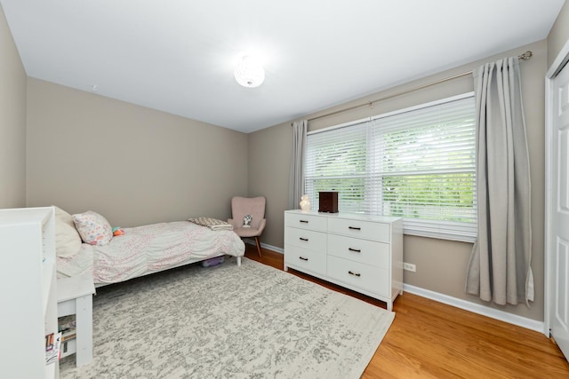 1613 Swallow St, Naperville, IL 60565 - bedroom with light wood finished floors and baseboards
