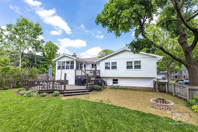1613 Swallow St, Naperville, IL 60565 - rear view of property featuring a fire pit, a wooden deck, and a chimney