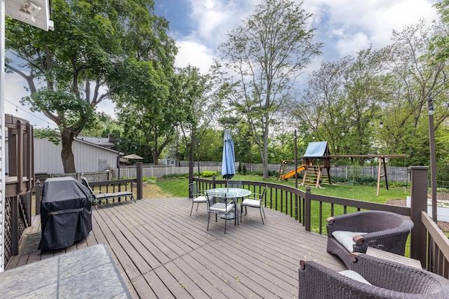 1613 Swallow St, Naperville, IL 60565 - wooden terrace with a playground, outdoor dining space, and area for grilling