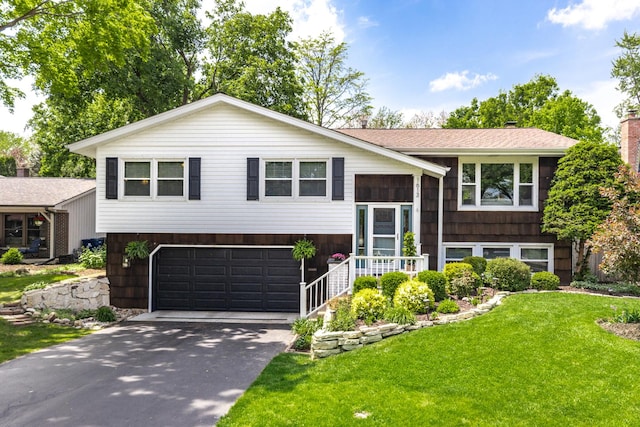 1613 Swallow St, Naperville, IL 60565 - bi-level home featuring a front yard, driveway, a garage, and a chimney