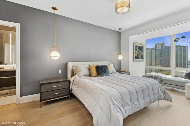 363 E Wacker Dr Unit 1601, Chicago, IL 60601 - bedroom with wood finished floors and ensuite bath