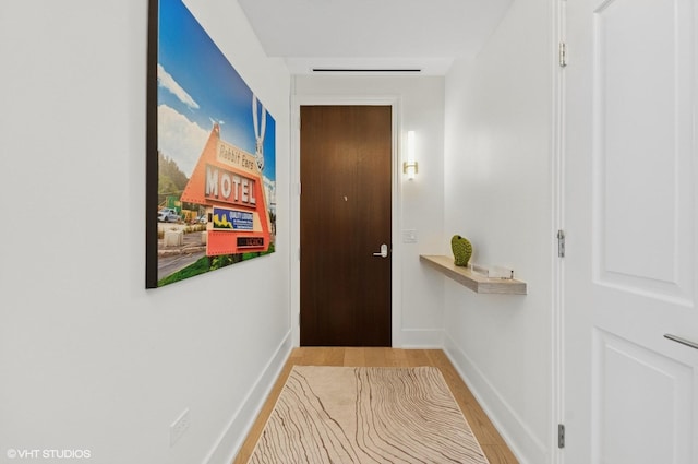 363 E Wacker Dr Unit 1601, Chicago, IL 60601 - doorway featuring wood finished floors and baseboards