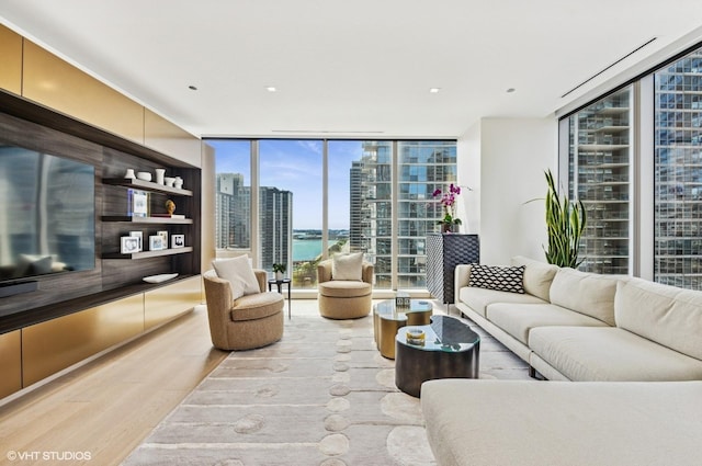 363 E Wacker Dr Unit 1601, Chicago, IL 60601 - living area with a wall of windows and wood finished floors