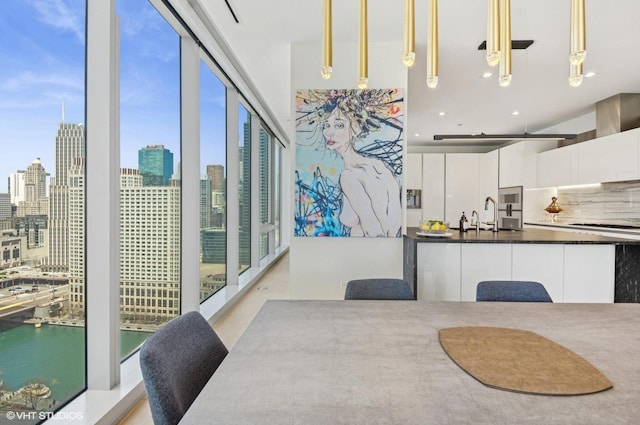 363 E Wacker Dr Unit 1601, Chicago, IL 60601 - dining room featuring a skyline view