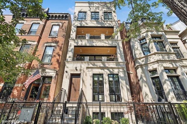 2034 N Mohawk St Unit 1, Chicago, IL 60614 - view of apartment building / complex featuring a fenced front yard