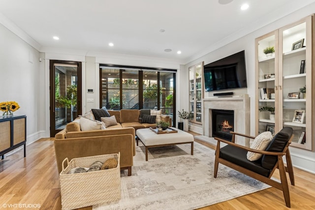 2034 N Mohawk St Unit 1, Chicago, IL 60614 - living room with ornamental molding, a lit fireplace, light wood-style floors, recessed lighting, and baseboards