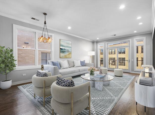 1355 W Washington Blvd Unit 4D, Chicago, IL 60607 - living area featuring plenty of natural light, ornamental molding, wood finished floors, and recessed lighting