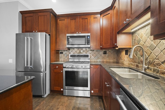 1355 W Washington Blvd Unit 4D, Chicago, IL 60607 - kitchen with stainless steel appliances, dark wood-type flooring, backsplash, crown molding, and dark stone counters