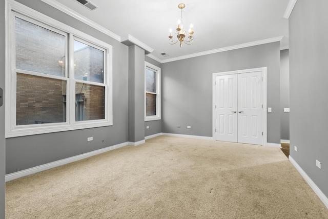 1355 W Washington Blvd Unit 4D, Chicago, IL 60607 - carpeted spare room featuring a chandelier and crown molding