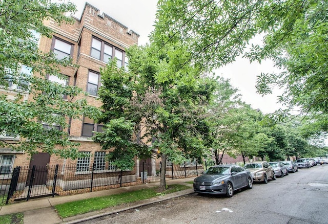 view of property with a fenced front yard