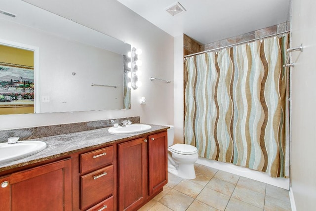 bathroom featuring tile patterned floors, double vanity, toilet, and curtained shower