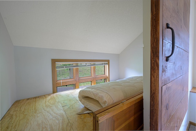 22 Valleywood Ln Unit 22, Galena, IL 61036 - bedroom with lofted ceiling