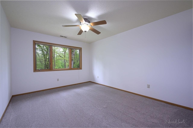 22 Valleywood Ln Unit 22, Galena, IL 61036 - spare room with carpet flooring, ceiling fan, and baseboards