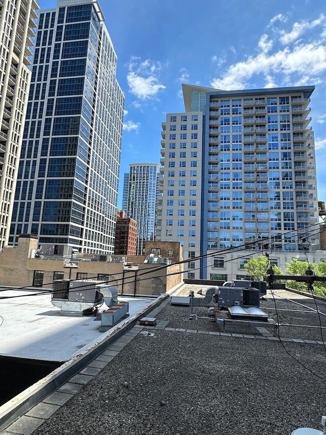 1307 S Wabash Ave Unit 402, Chicago, IL 60605 - view of vehicle parking featuring a view of city