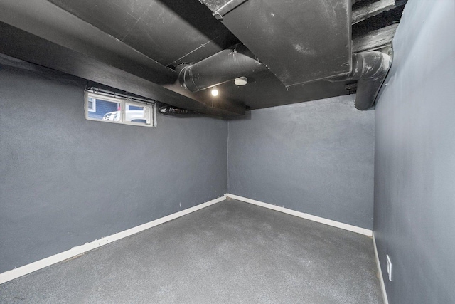 basement featuring baseboards