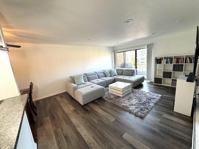 1919 Prairie Sq Unit 231, Schaumburg, IL 60173 - living area with dark wood-style flooring