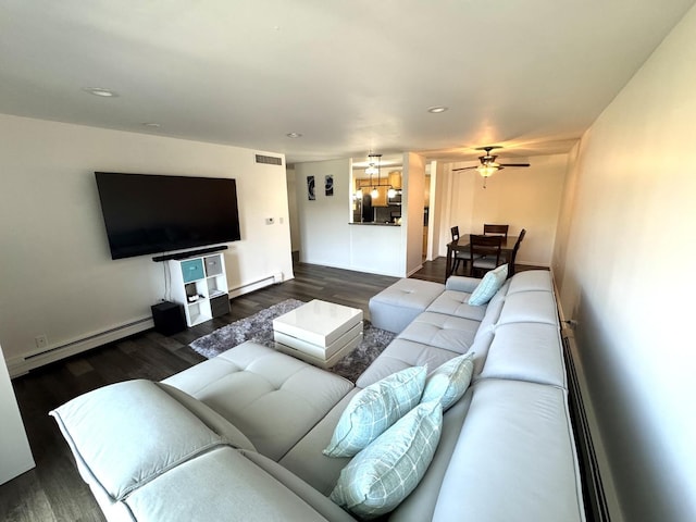 1919 Prairie Sq Unit 231, Schaumburg, IL 60173 - living area with a baseboard radiator, wood finished floors, ceiling fan, recessed lighting, and baseboards