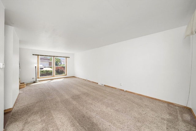 17714 Dogwood Ln, Hazel Crest, IL 60429 - spare room featuring carpet flooring and baseboards