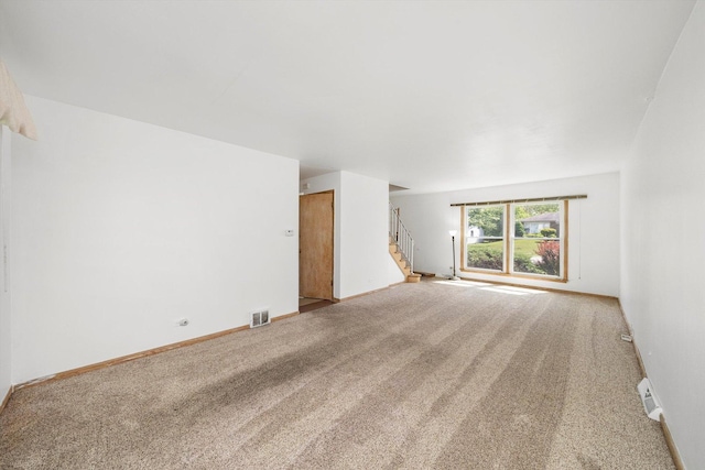 17714 Dogwood Ln, Hazel Crest, IL 60429 - carpeted empty room with stairs and baseboards