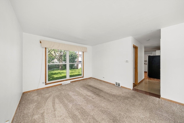 17714 Dogwood Ln, Hazel Crest, IL 60429 - carpeted empty room featuring baseboards