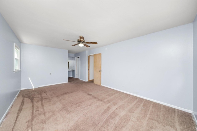 17714 Dogwood Ln, Hazel Crest, IL 60429 - carpeted empty room with a ceiling fan and baseboards