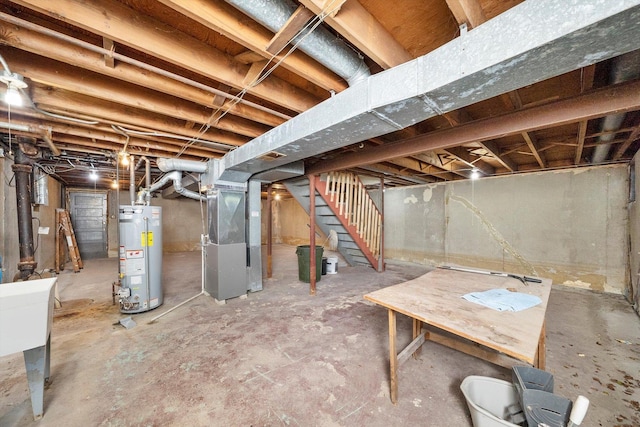 17714 Dogwood Ln, Hazel Crest, IL 60429 - unfinished below grade area featuring water heater, heating unit, stairs, and a sink