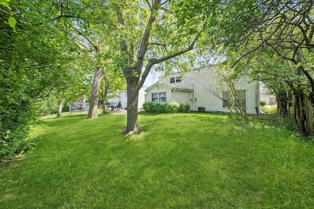 17714 Dogwood Ln, Hazel Crest, IL 60429 - view of grassy yard featuring central air condition unit