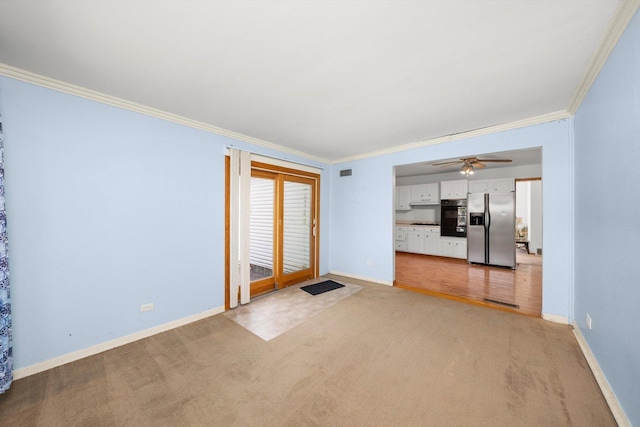 17714 Dogwood Ln, Hazel Crest, IL 60429 - unfurnished living room featuring light colored carpet, ornamental molding, baseboards, and ceiling fan