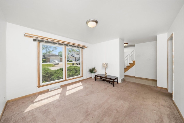 17714 Dogwood Ln, Hazel Crest, IL 60429 - living area with carpet flooring, stairway, and baseboards