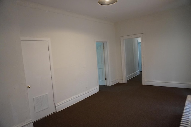 7225 S Princeton Ave, Chicago, IL 60621 - unfurnished room with dark carpet