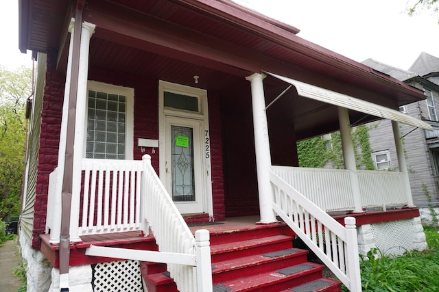 7225 S Princeton Ave, Chicago, IL 60621 - doorway to property featuring covered porch