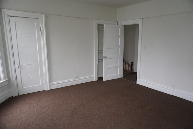7225 S Princeton Ave, Chicago, IL 60621 - unfurnished bedroom with dark carpet