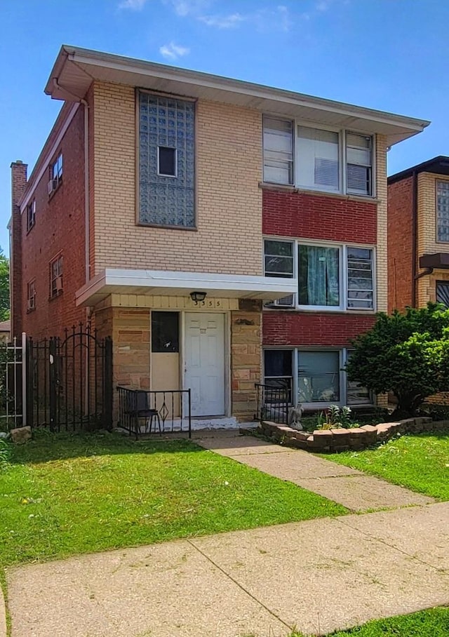 3355 W 65th St, Chicago, IL 60629 - view of front of property featuring brick siding