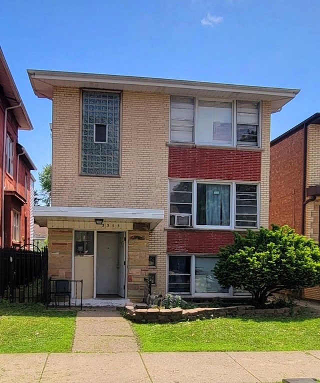 3355 W 65th St, Chicago, IL 60629 - view of front of house with brick siding and cooling unit