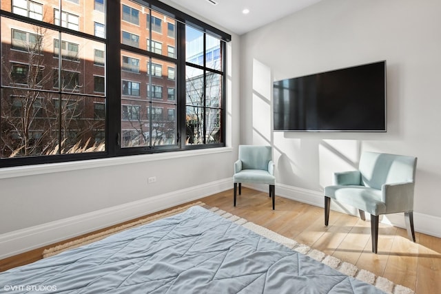 1109 W Washington Blvd Unit 2B, Chicago, IL 60607 - sitting room with baseboards and wood finished floors