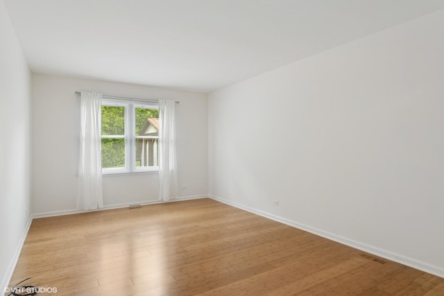 1118 W Keating Dr, Arlington Heights, IL 60005 - empty room with light wood-type flooring and baseboards