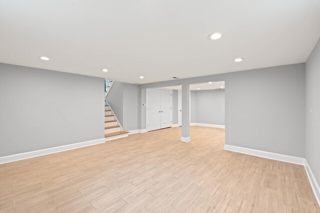 44 Cranbrook Dr, Des Plaines, IL 60016 - finished below grade area with baseboards, stairs, light wood finished floors, and recessed lighting