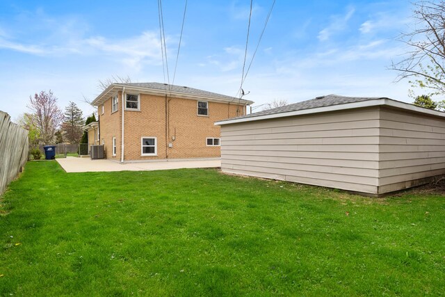 44 Cranbrook Dr, Des Plaines, IL 60016 - back of property featuring central AC, a patio area, and brick siding