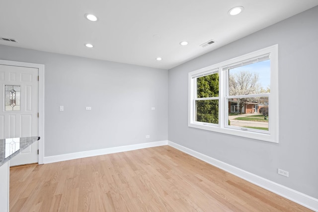 44 Cranbrook Dr, Des Plaines, IL 60016 - unfurnished room featuring baseboards, recessed lighting, and light wood finished floors