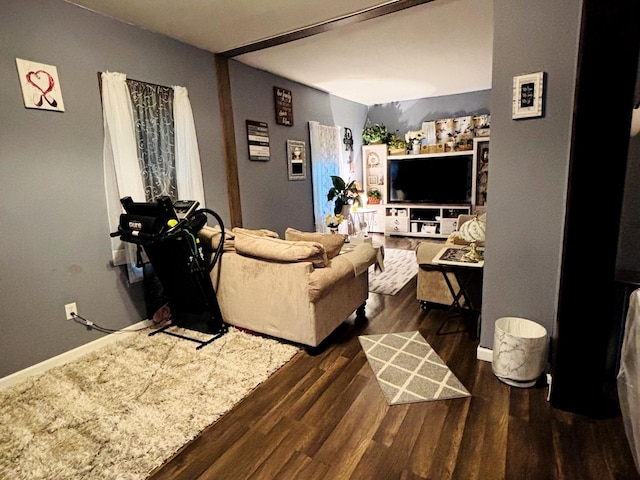 484 Hickory Pl, Elgin, IL 60120 - living area with dark wood-style flooring and baseboards